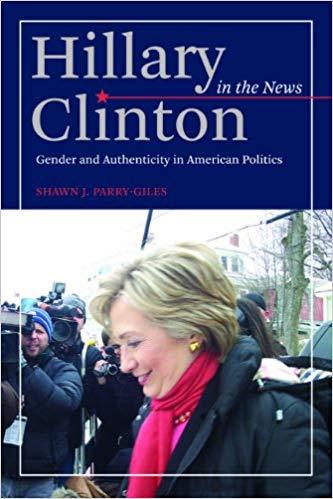 Book cover, Hilary Clinton outside looking down smiling with photographers in the background