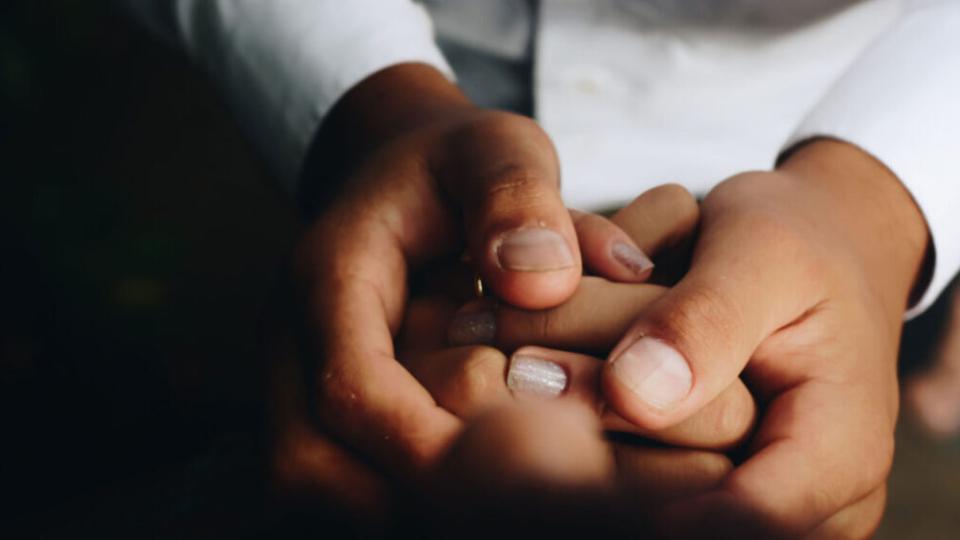 hands being held