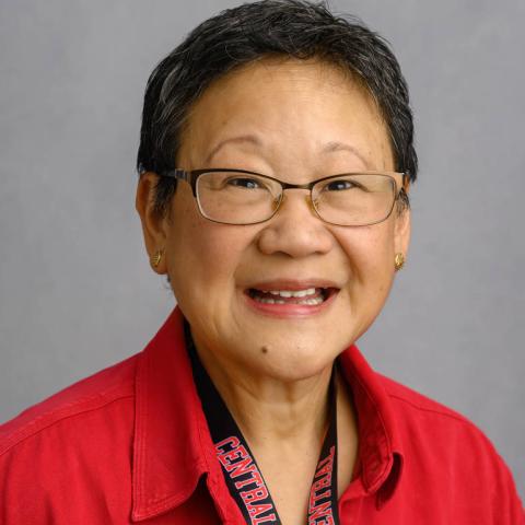 Sandra Gong in a red button down shirt 