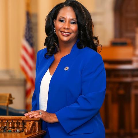 Verlina Reynolds-Jackson wearing a blue suit in the New Jersey state house 
