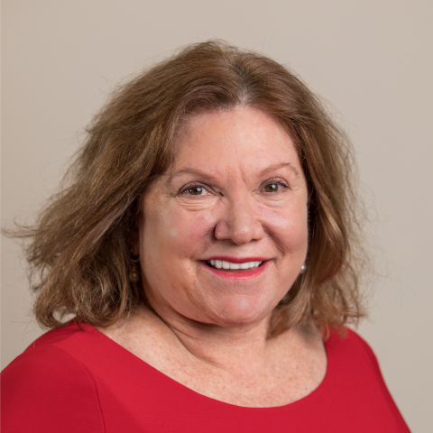 Headshot of Gail Gordon in a red shirt 