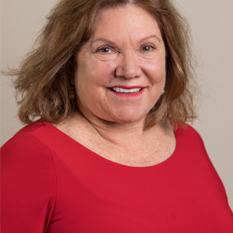 Headshot of Gail Gordon in a red shirt 