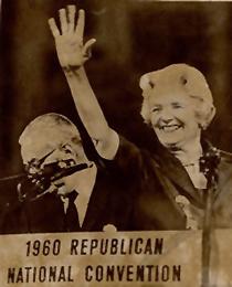 Katherine Neuberger smiling and waving behind 1960 Republican National Convention podium