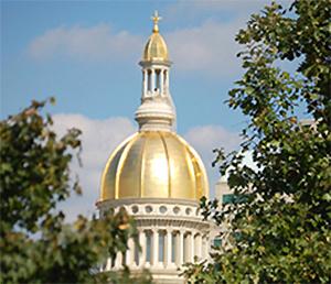 Golden dome of the Capitol building in Trenton.
